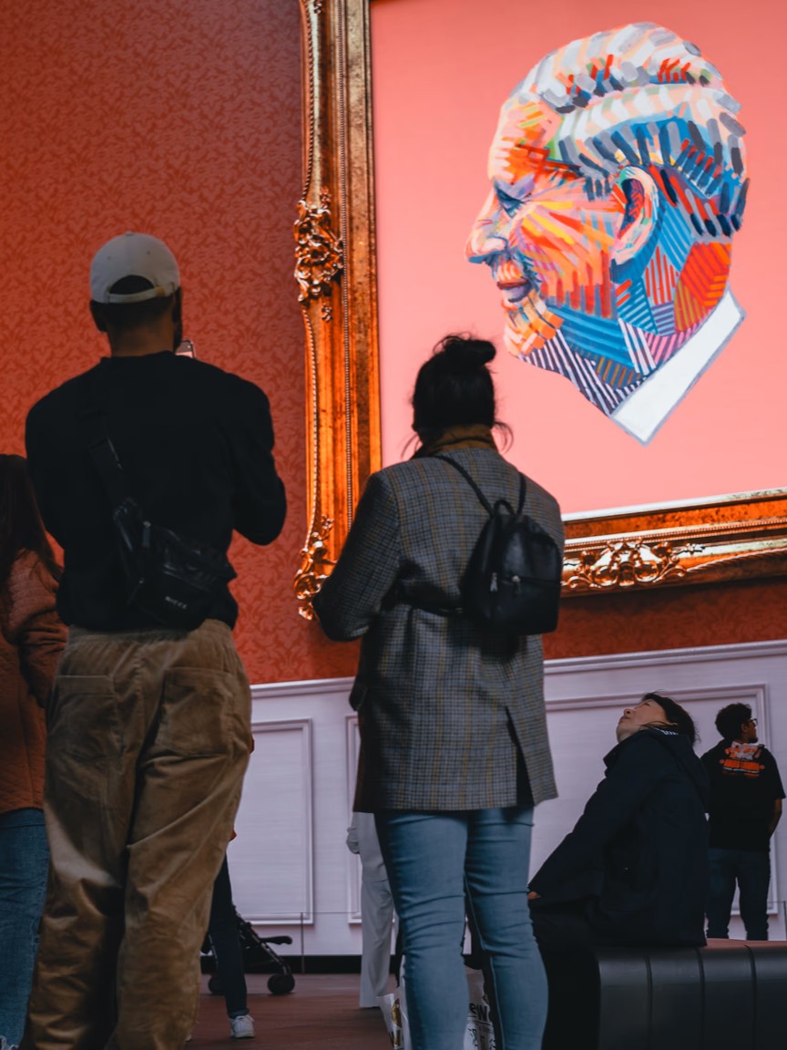 Sam Barnett's painting of the King displayed in a gallery